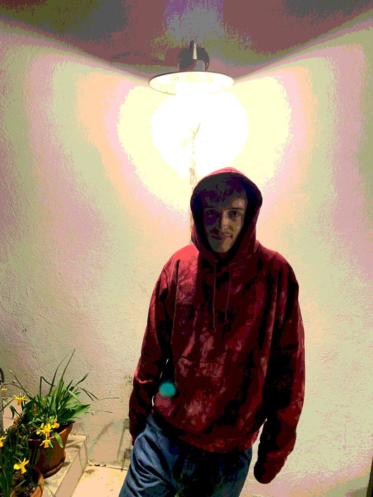 SUBTROPIC X Champion Tie-Dye Red Hoodie worn by model 5