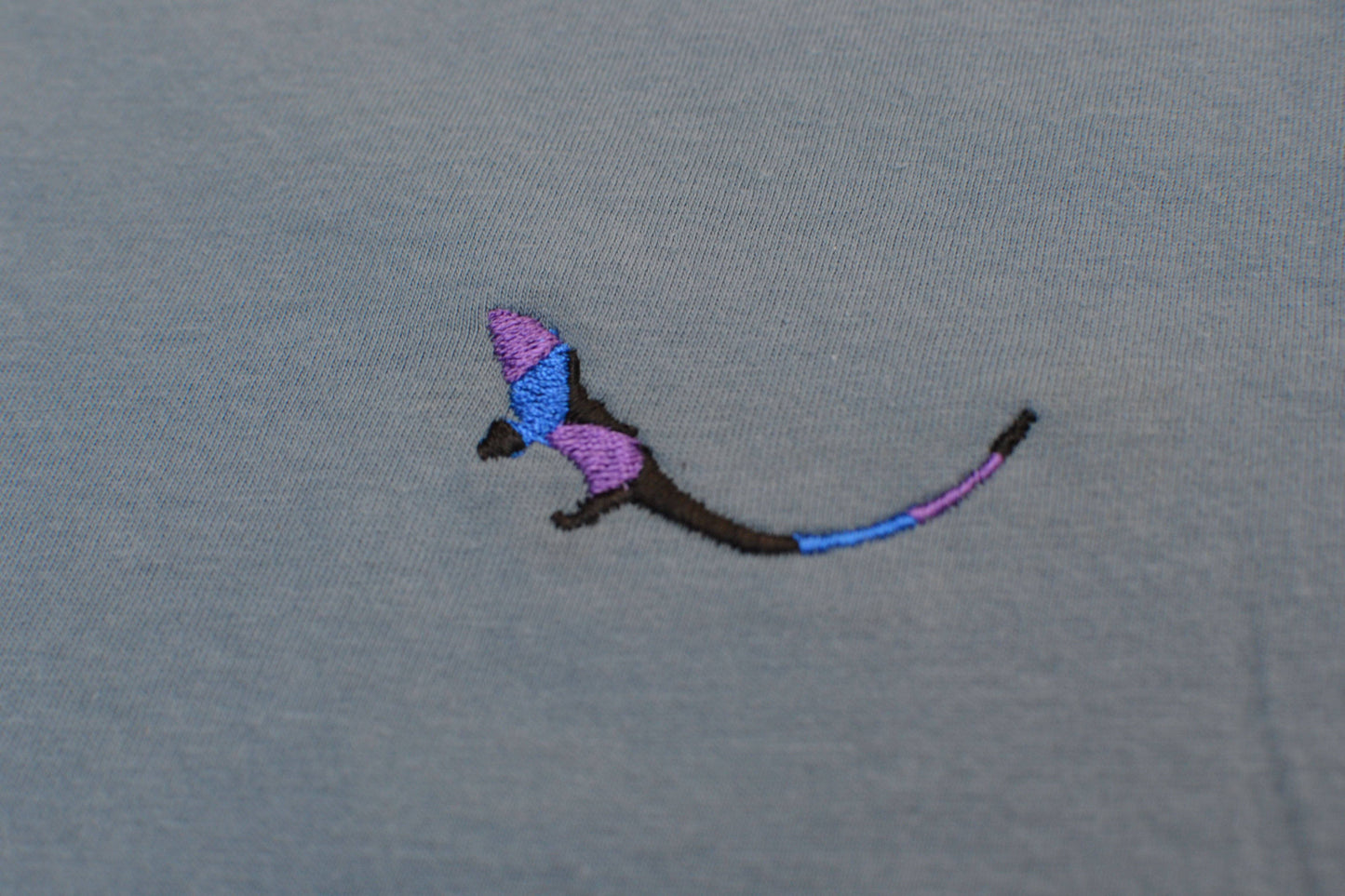 THE SUBTROPIC emblem in Steel Blue Tshirt