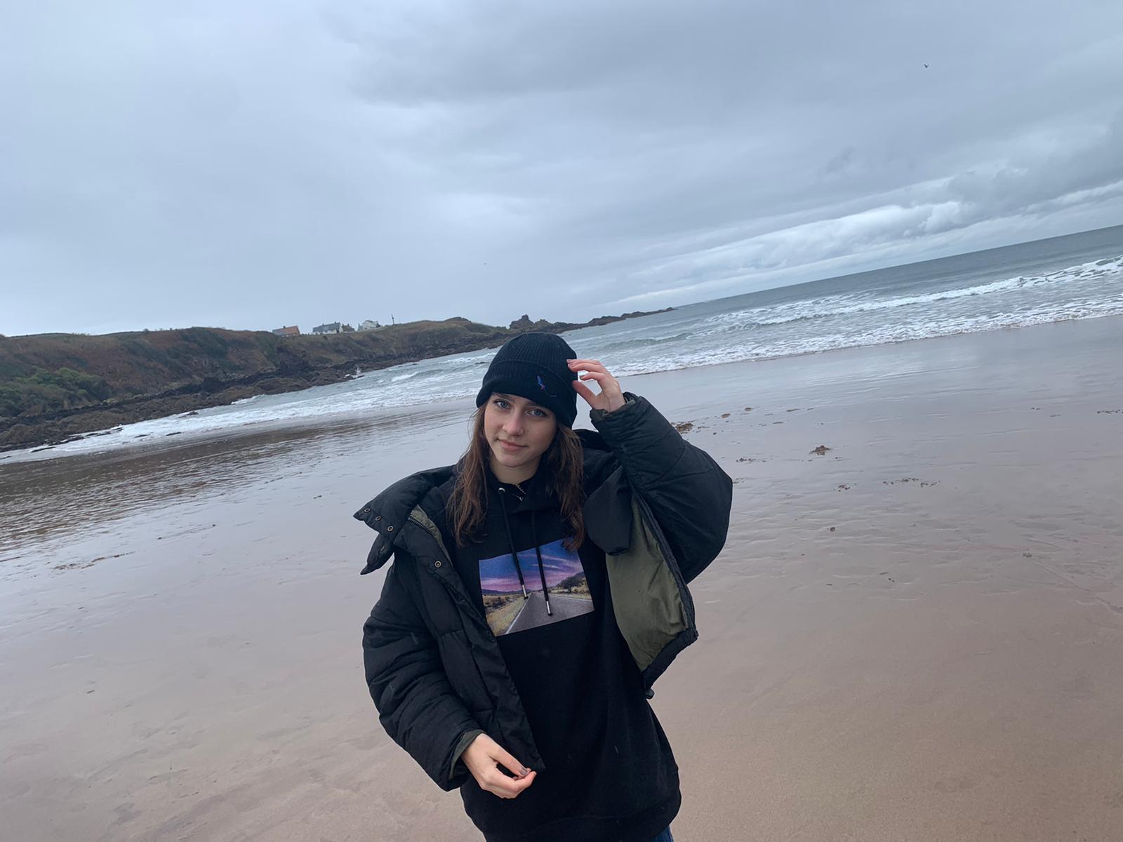 Black Organic Eco-Beanie model with Road To Nowhere Hoodie
