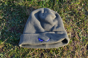 Forest Organic Eco-Beanie sitting on grass