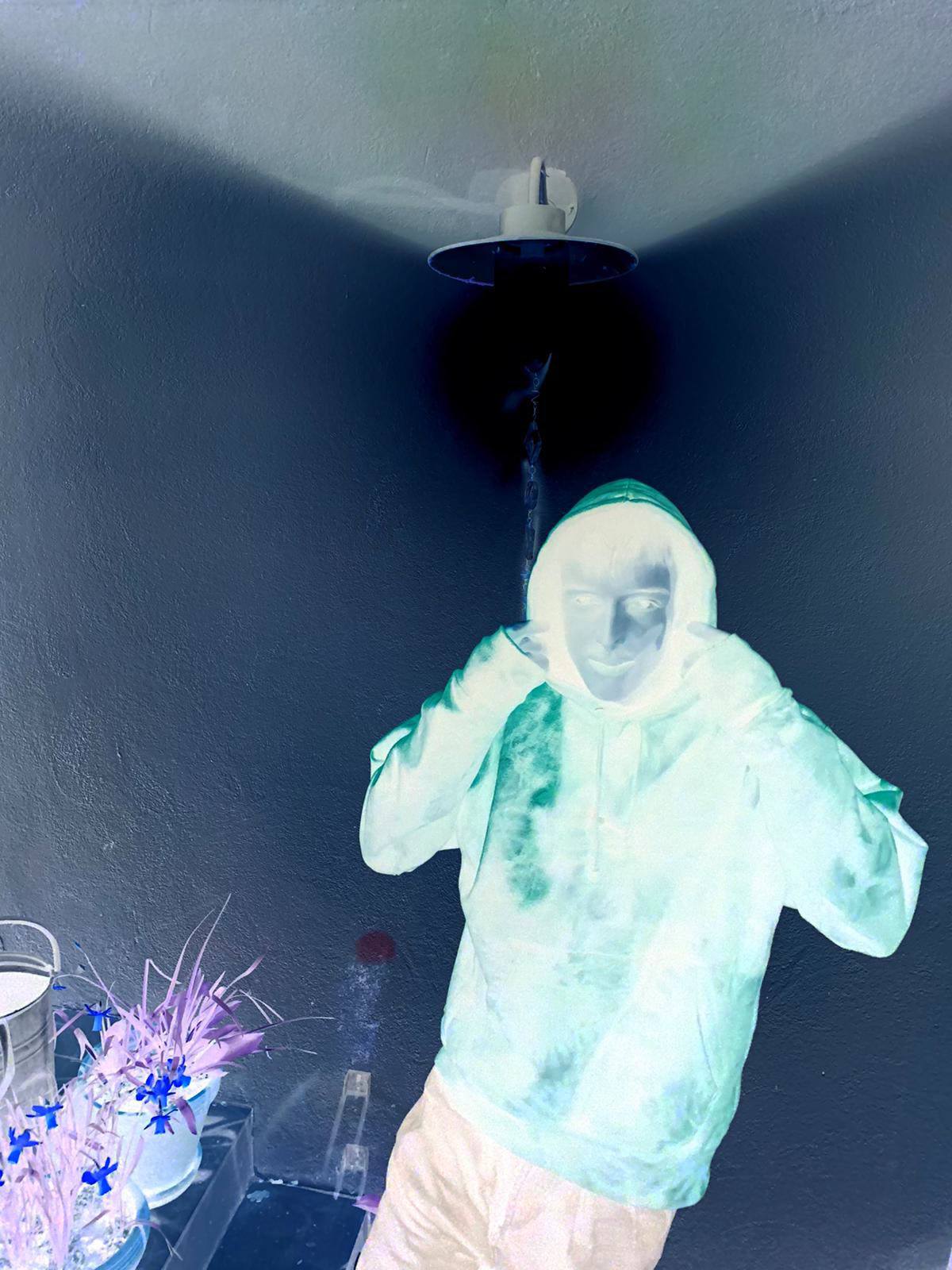 SUBTROPIC X Champion Tie-Dye Navy Hoodie worn by model 1