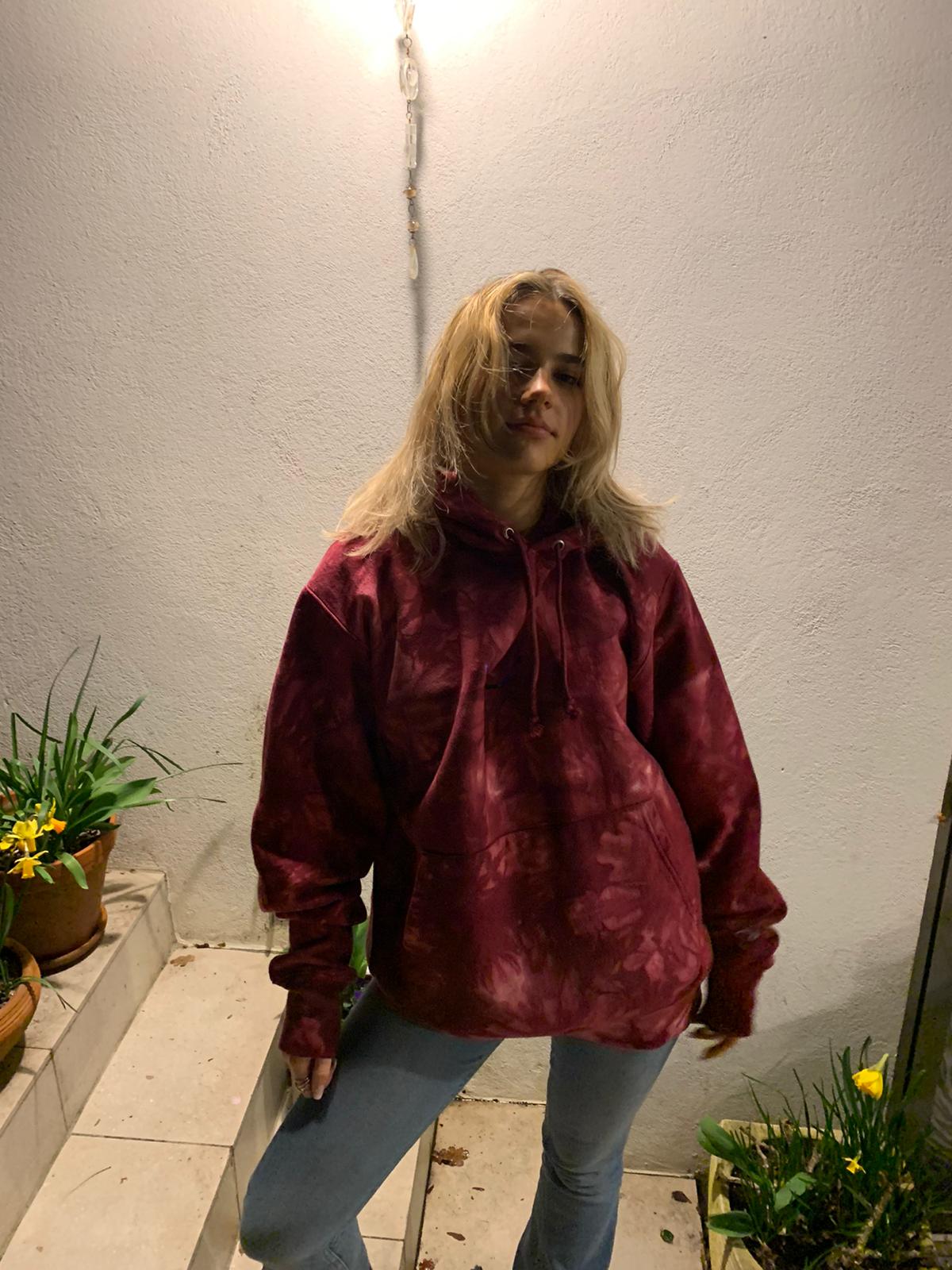 SUBTROPIC X Champion Tie-Dye Red Hoodie worn by model 3