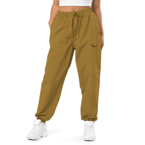 THE SUBTROPIC Recycled Tracksuit Bottoms Olive Model
